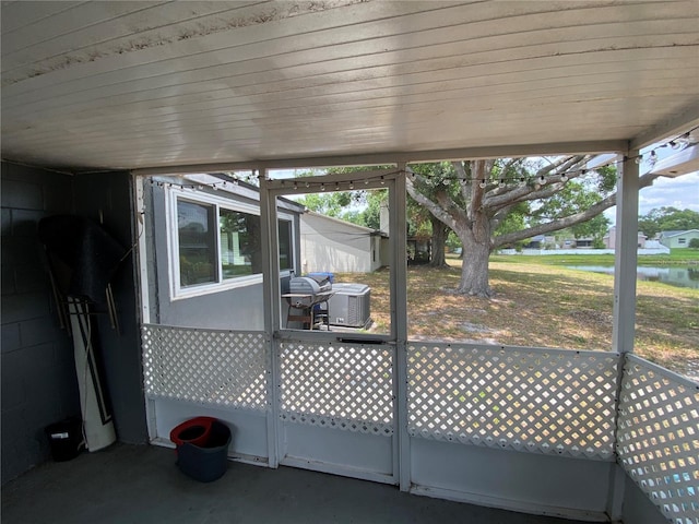12912 Leadwood Dr, Riverview, FL 33579 - unfurnished sunroom with a water view