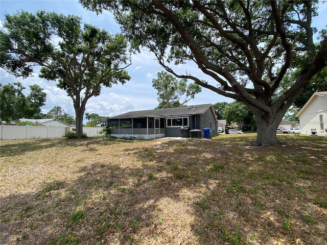 12912 Leadwood Dr, Riverview, FL 33579 - view of yard with a sunroom and fence