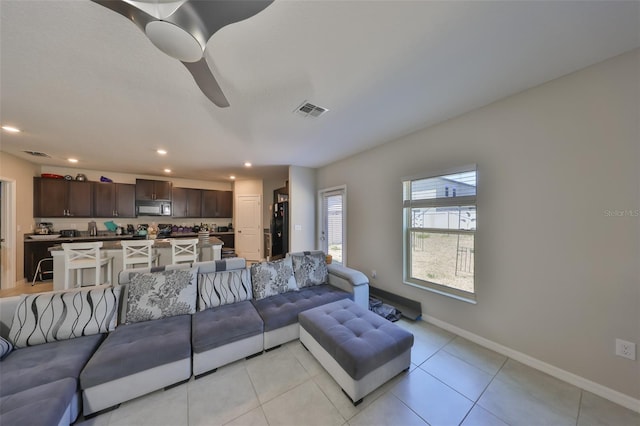 10210 White Linen Ave, Riverview, FL 33578 - living area featuring ceiling fan, baseboards, recessed lighting, and light tile patterned floors