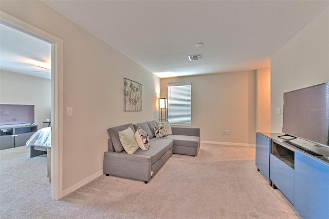 10210 White Linen Ave, Riverview, FL 33578 - living area with light colored carpet and baseboards