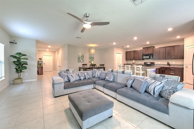 10210 White Linen Ave, Riverview, FL 33578 - living area with light tile patterned flooring, a ceiling fan, and recessed lighting