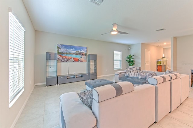 10210 White Linen Ave, Riverview, FL 33578 - living area featuring light tile patterned flooring and a ceiling fan