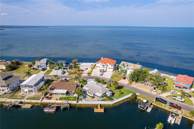 aerial perspective of suburban area featuring a large body of water