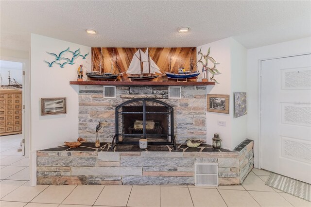 detailed view of a textured ceiling and a fireplace