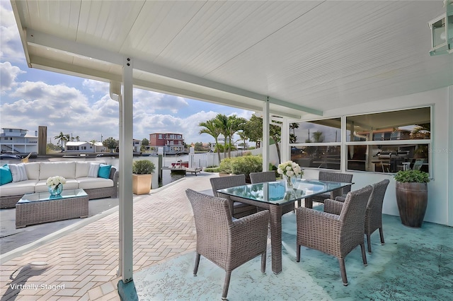 view of patio / terrace with outdoor lounge area and outdoor dining area