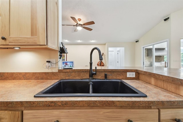 160 Sage Cir, Crystal Beach, FL 34681 - kitchen featuring a sink, a ceiling fan, and light brown cabinetry
