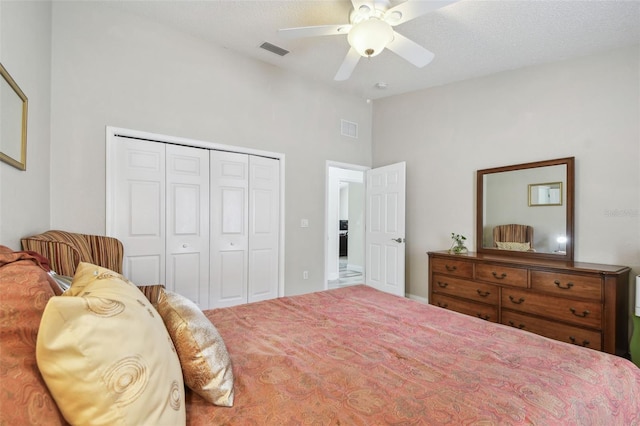 160 Sage Cir, Crystal Beach, FL 34681 - bedroom featuring a closet, ceiling fan, and high vaulted ceiling