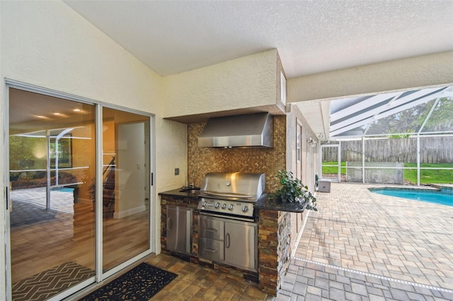 160 Sage Cir, Crystal Beach, FL 34681 - view of patio / terrace featuring a grill, an outdoor pool, an outdoor kitchen, and glass enclosure