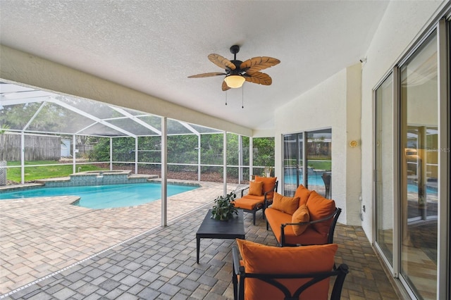 160 Sage Cir, Crystal Beach, FL 34681 - view of pool with a patio area, a pool with connected hot tub, ceiling fan, outdoor lounge area, and glass enclosure