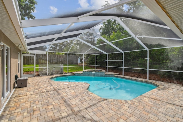 160 Sage Cir, Crystal Beach, FL 34681 - view of pool featuring a patio area, a pool with connected hot tub, and a lanai
