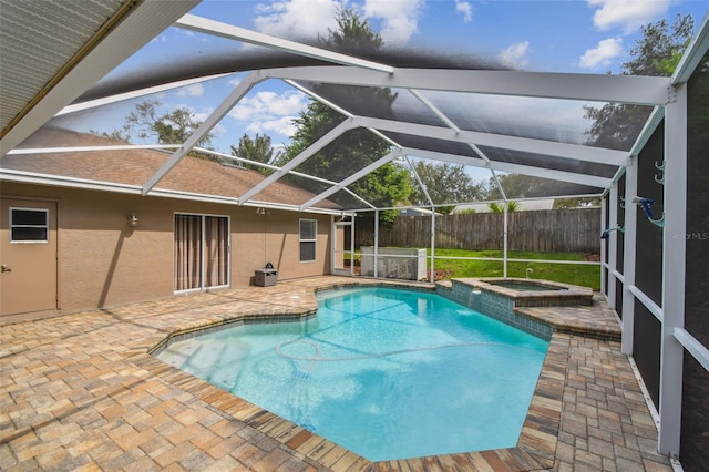 160 Sage Cir, Crystal Beach, FL 34681 - view of swimming pool featuring a patio, fence, glass enclosure, and a pool with connected hot tub