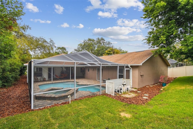 160 Sage Cir, Crystal Beach, FL 34681 - rear view of house featuring an in-ground hot tub, stucco siding, a lanai, a patio, and roof with shingles