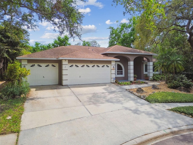 160 Sage Cir, Crystal Beach, FL 34681 - ranch-style home featuring stucco siding, a garage, concrete driveway, and roof with shingles