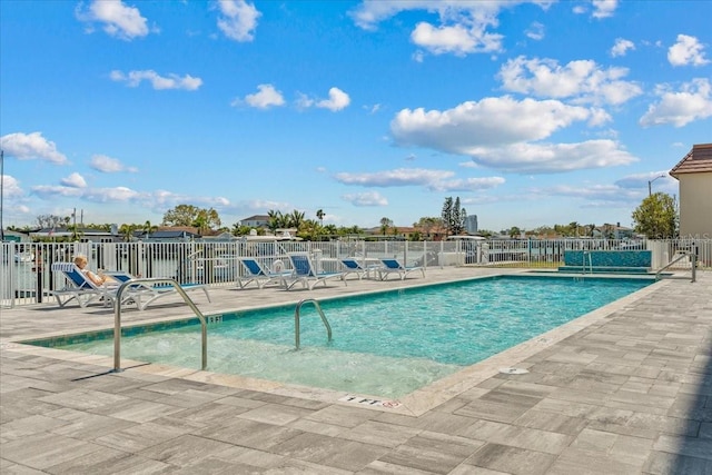 415 Island Way Unit 303, Clearwater Beach, FL 33767 - community pool with a patio area and fence