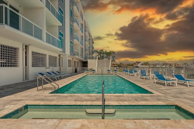 415 Island Way Unit 303, Clearwater Beach, FL 33767 - community pool featuring fence and a patio