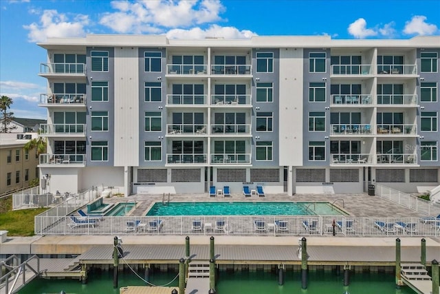 415 Island Way Unit 303, Clearwater Beach, FL 33767 - view of apartment building / complex with a water view