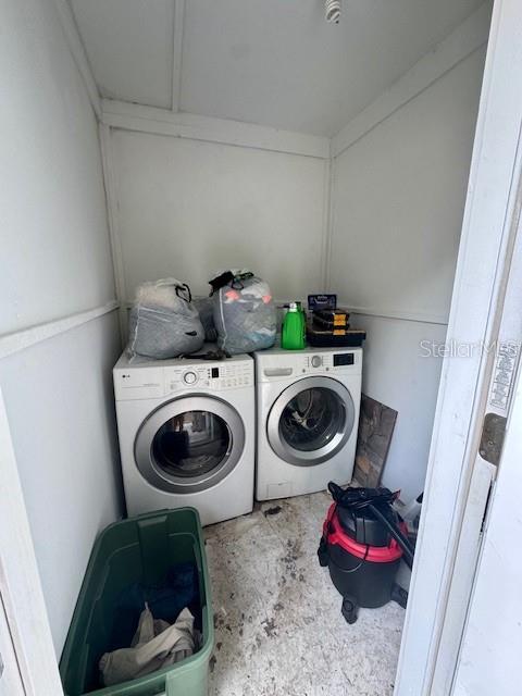 144 Douglas Rd W Unit F, Oldsmar, FL 34677 - washroom with separate washer and dryer