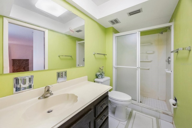 full bath featuring toilet, a shower stall, tile patterned floors, and vanity