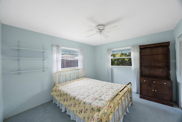 bedroom with carpet flooring and ceiling fan