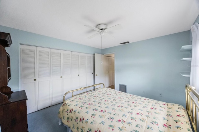 bedroom featuring a closet, carpet, and a ceiling fan