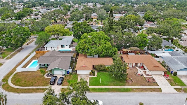 aerial view of residential area featuring a pool area