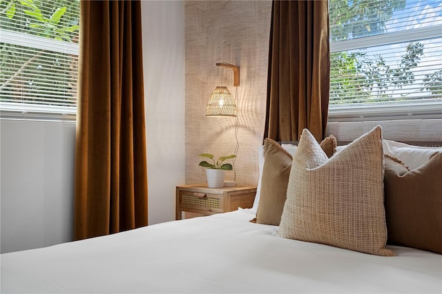 bedroom with multiple windows