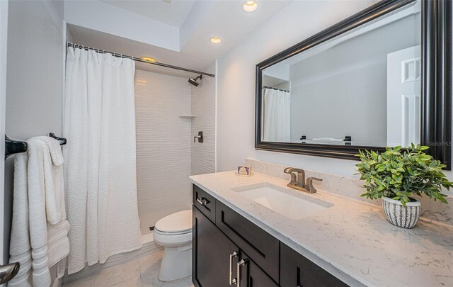 1402 Oleander Dr, Tarpon Springs, FL 34689 - full bath with vanity, recessed lighting, toilet, and a shower with shower curtain