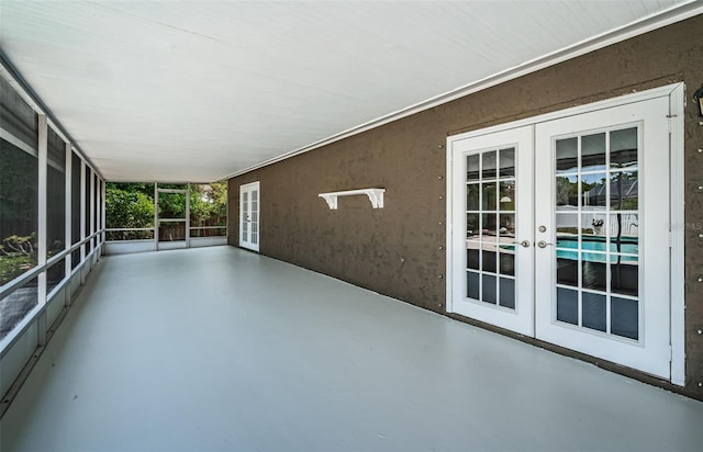 1402 Oleander Dr, Tarpon Springs, FL 34689 - unfurnished sunroom with french doors