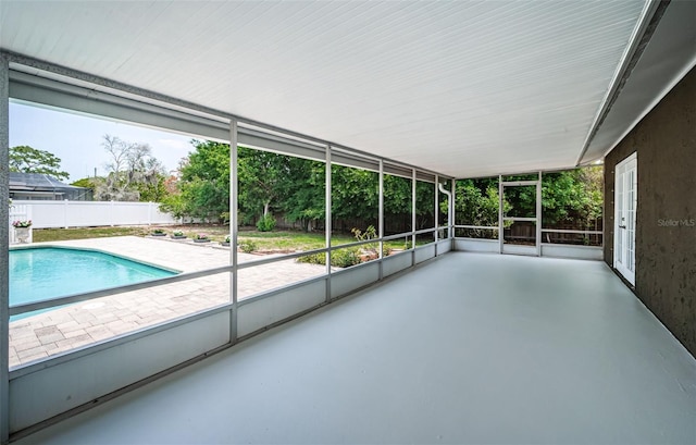 1402 Oleander Dr, Tarpon Springs, FL 34689 - unfurnished sunroom featuring healthy amount of natural light
