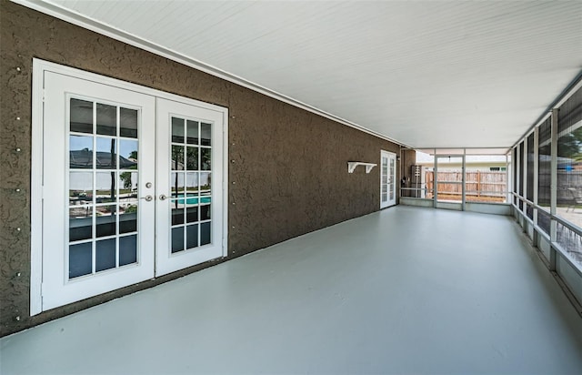 1402 Oleander Dr, Tarpon Springs, FL 34689 - unfurnished sunroom featuring french doors