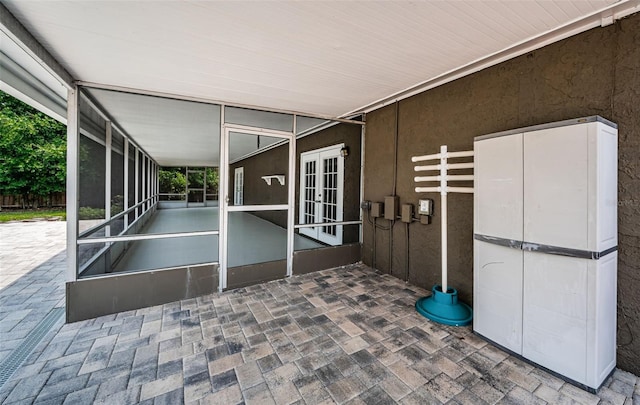 1402 Oleander Dr, Tarpon Springs, FL 34689 - view of patio featuring french doors