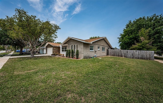1402 Oleander Dr, Tarpon Springs, FL 34689 - view of side of home with an attached garage and concrete driveway