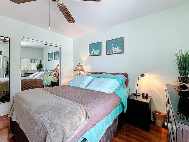 230 Medallion Blvd Unit G, Madeira Beach, FL 33708 - bedroom featuring wood finished floors, a ceiling fan, and a closet