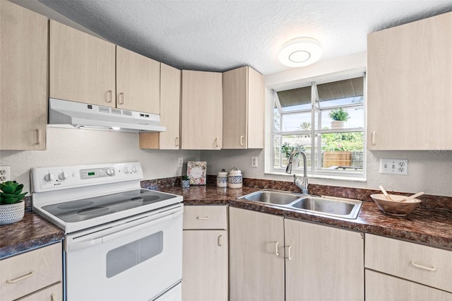 kitchen featuring under cabinet range hood, electric range, a sink, light brown cabinets, and a textured ceiling