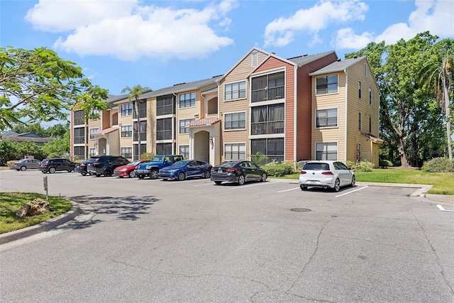 11901 4th St N Unit 8207, Saint Petersburg, FL 33716 - view of apartment building / complex featuring uncovered parking
