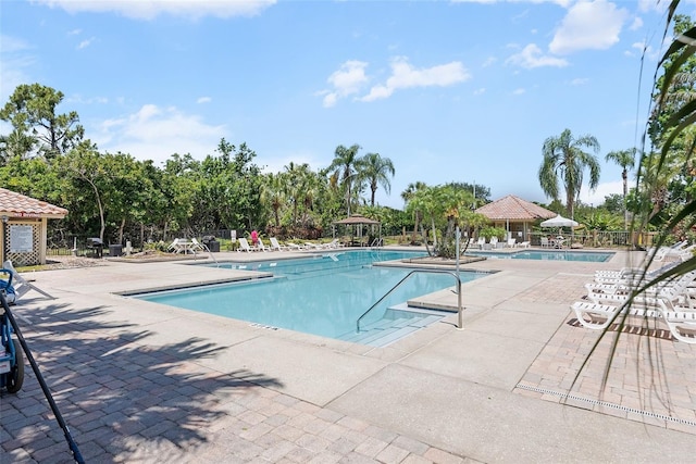 11901 4th St N Unit 8207, Saint Petersburg, FL 33716 - community pool featuring fence, a gazebo, and a patio