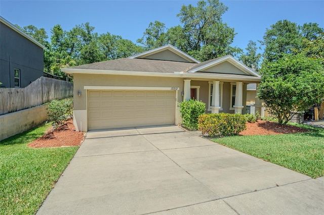 view of front of home featuring an attached garage, stucco siding, concrete driveway, and a porch