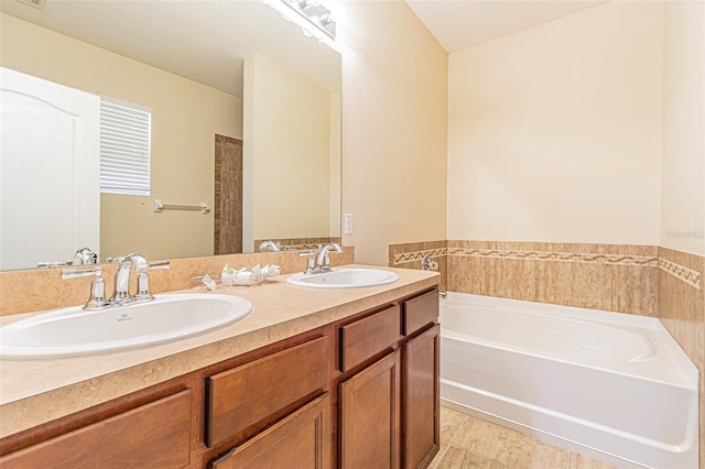 full bathroom featuring a bath and double vanity