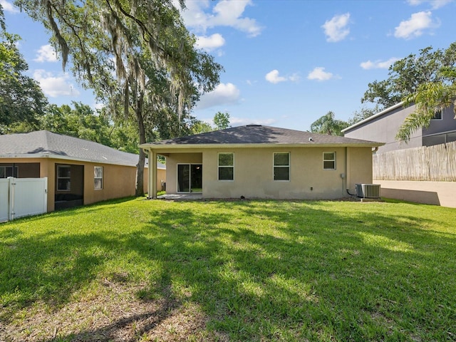 12212 Mcmullen Loop, Riverview, FL 33569 - rear view of property featuring central AC unit and stucco siding