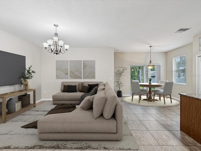 12212 Mcmullen Loop, Riverview, FL 33569 - living room with baseboards, a chandelier, and light tile patterned floors