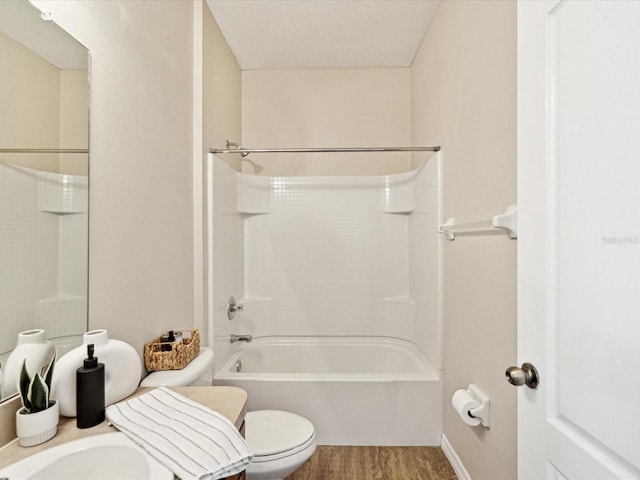 12212 Mcmullen Loop, Riverview, FL 33569 - bathroom featuring toilet, wood finished floors, bathtub / shower combination, and vanity