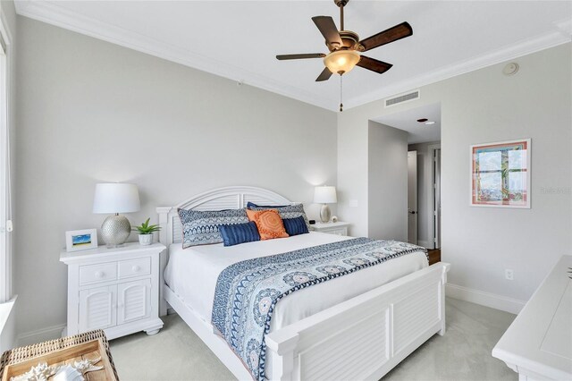 140 Riviera Dunes Way Unit 1203, Palmetto, FL 34221 - bedroom featuring light carpet, crown molding, baseboards, and ceiling fan