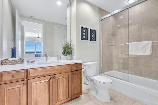 140 Riviera Dunes Way Unit 1203, Palmetto, FL 34221 - full bath featuring tile patterned floors, toilet, vanity, and bath / shower combo with glass door