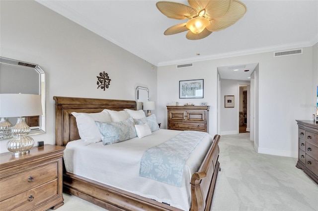 140 Riviera Dunes Way Unit 1203, Palmetto, FL 34221 - bedroom with light carpet, crown molding, baseboards, and a ceiling fan