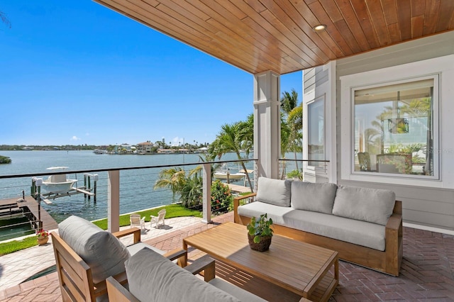 443 18th Ave, Indian Rocks Beach, FL 33785 - balcony with an outdoor living space and a water view