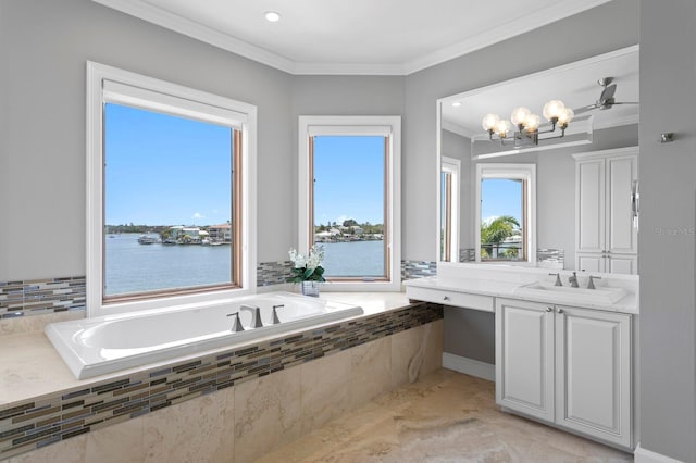443 18th Ave, Indian Rocks Beach, FL 33785 - bathroom with ornamental molding, a bath, vanity, a chandelier, and a water view
