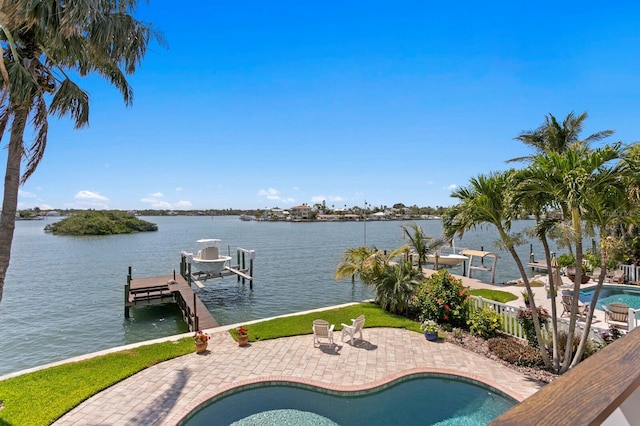443 18th Ave, Indian Rocks Beach, FL 33785 - dock featuring boat lift, an outdoor pool, a patio, and a water view