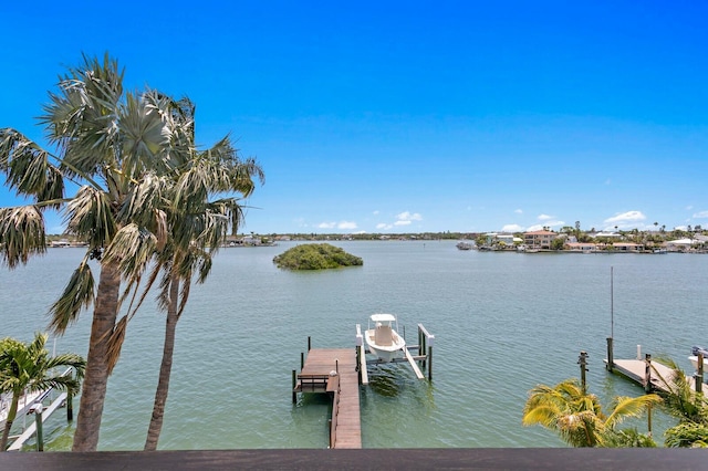 443 18th Ave, Indian Rocks Beach, FL 33785 - dock area featuring boat lift and a water view