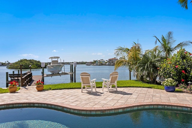 443 18th Ave, Indian Rocks Beach, FL 33785 - swimming pool with boat lift, a boat dock, and a water view