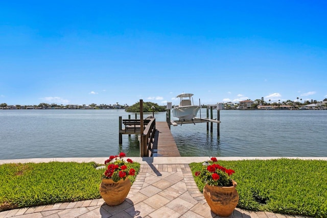 443 18th Ave, Indian Rocks Beach, FL 33785 - dock featuring boat lift and a water view